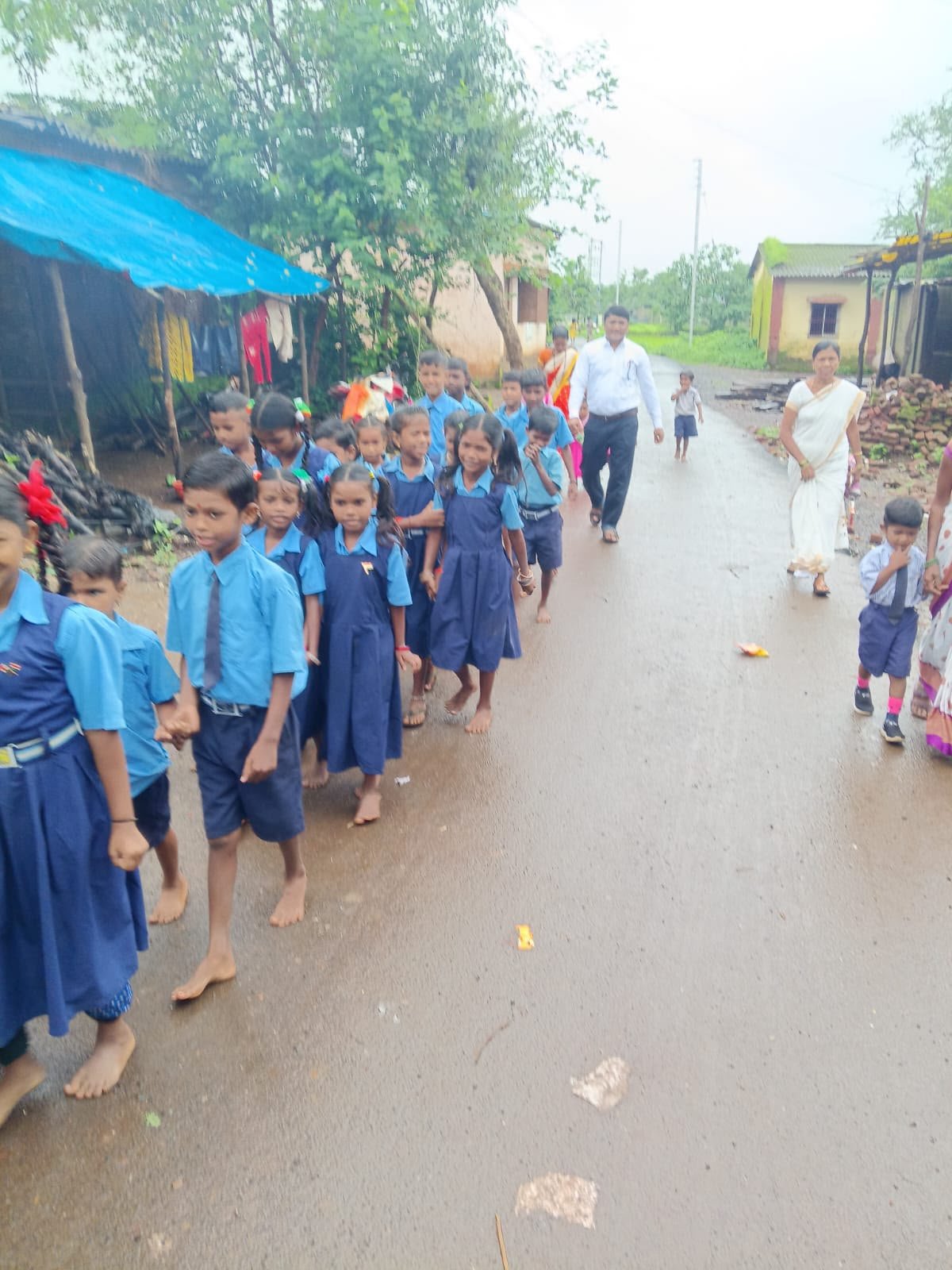 Children walking through the local community during a Rudra Foundation outreach activity
